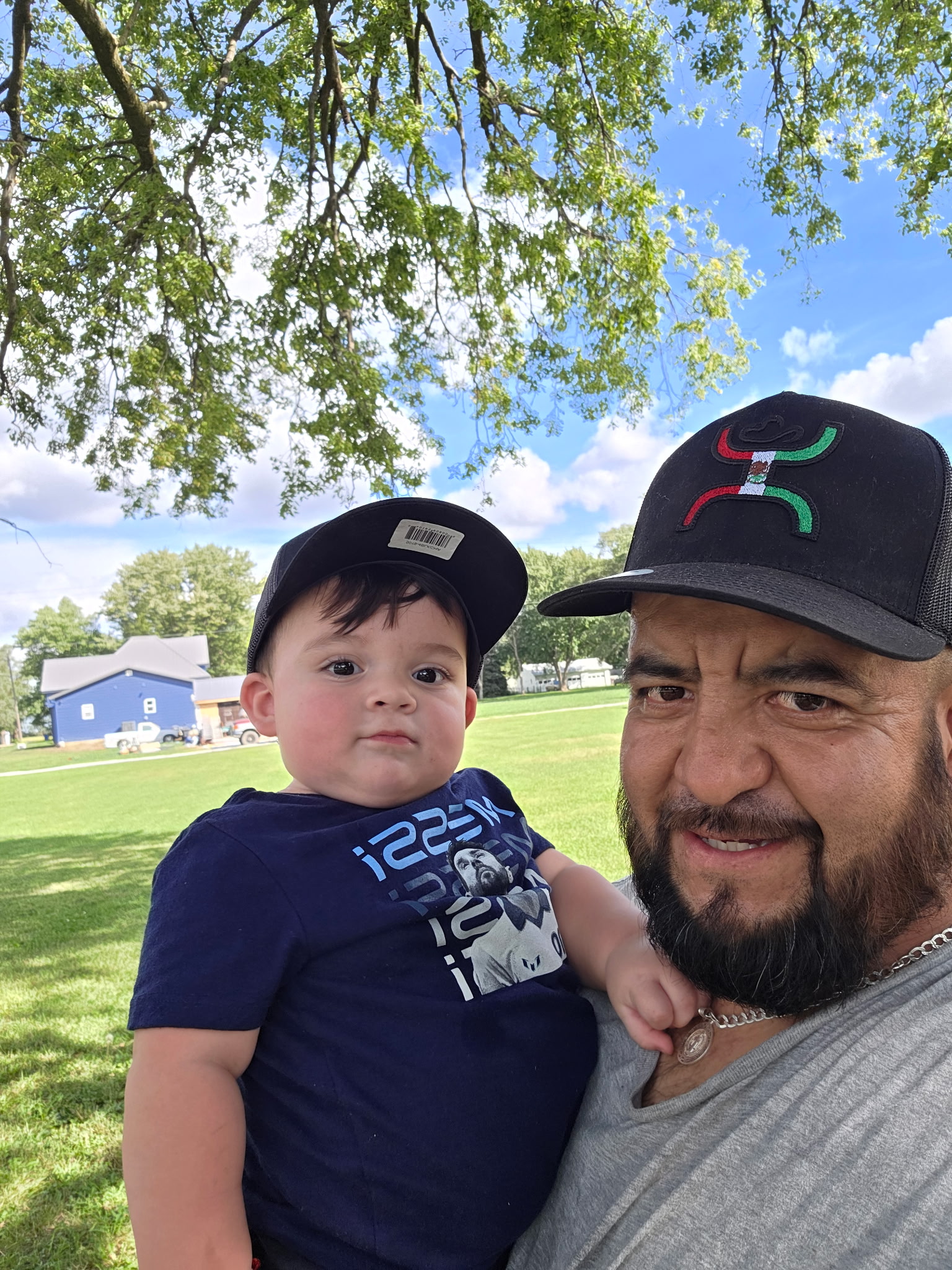 Adrian Trejo with his son